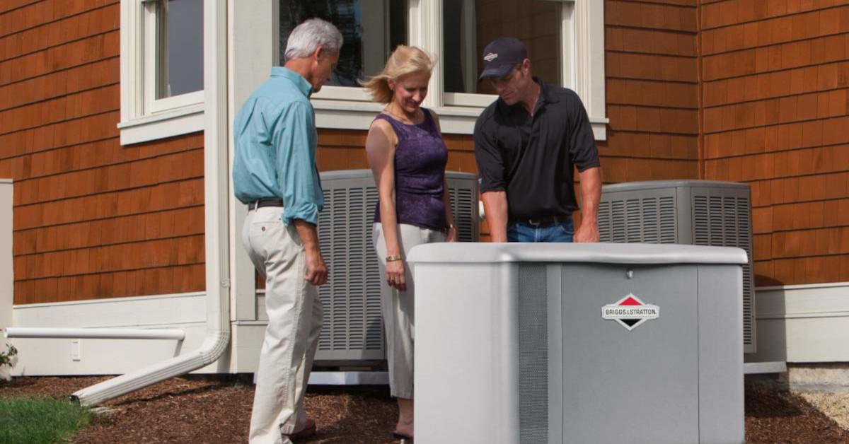 A Standby Generator Installer Shows a Couple Their New Home Standby Generator Installation